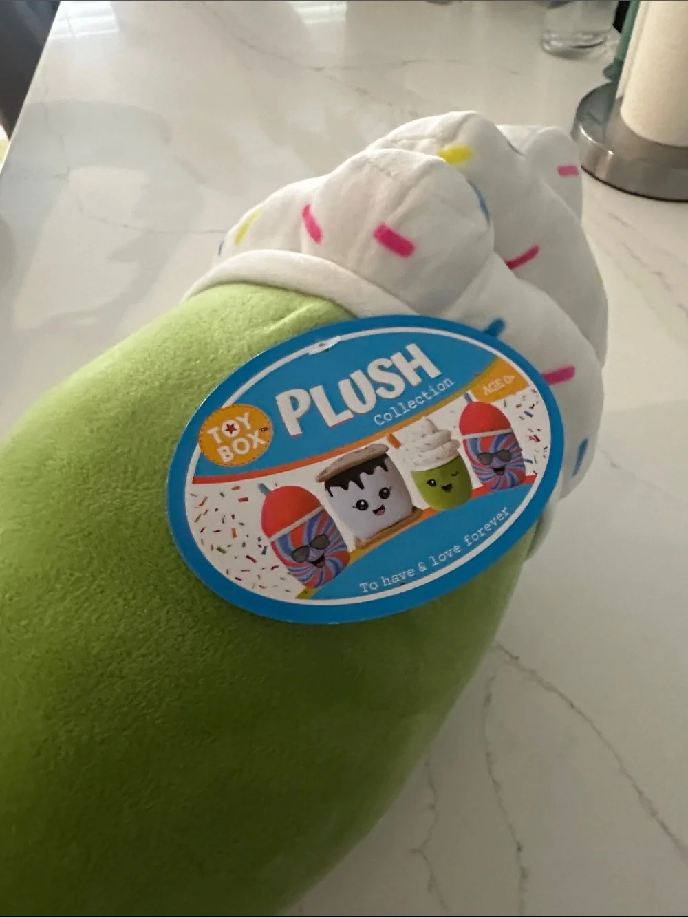 New tags on Green Plush Cup Kids Accessory with Whipped-Top Sprinkles